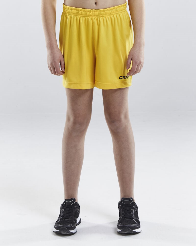 Craft - Squad Go Short Solid Jr Sweden Yellow 122/128